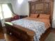 Spacious main bedroom with a large bed and ample natural light at 625 Locust Rd, Locust Grove, GA 30248