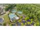 Community amenities with sparkling pools, tennis courts, playground, and ample parking at 2076 Towne Mill Ave, Canton, GA 30114