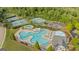 Resort-style community pool featuring a water slide, splash pad, and comfortable lounge seating at 2076 Towne Mill Ave, Canton, GA 30114