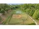 Baseball field and basketball court in community, with walking trails at 2076 Towne Mill Ave, Canton, GA 30114