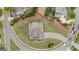 Beautiful aerial view showcasing this home with lush lawns and landscaping, surrounded by a serene neighborhood at 2076 Towne Mill Ave, Canton, GA 30114