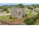 Aerial view of a home showing the backyard, landscaping, and neighborhood surroundings at 2076 Towne Mill Ave, Canton, GA 30114