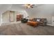 Versatile bonus room with ample space for living, with a sofa and comfortable chair at 2076 Towne Mill Ave, Canton, GA 30114