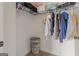 Organized closet with wire shelving and hanging clothes, providing ample storage space at 2076 Towne Mill Ave, Canton, GA 30114