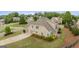 Stunning home featuring a three-car garage, mature landscaping, and a well-maintained lawn at 2076 Towne Mill Ave, Canton, GA 30114