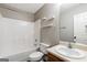 A bathroom includes a bath, toilet, sink and mirror at 3775 Highway 16 E, Sharpsburg, GA 30277