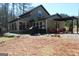 Inviting home with a covered patio, grill, and outdoor seating perfect for entertaining at 460 Morgan Mill Rd, Brooks, GA 30205