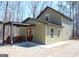 Beautiful home with outdoor seating and patio, perfect for relaxation and entertainment at 460 Morgan Mill Rd, Brooks, GA 30205