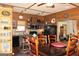 Rustic kitchen with wood accents, modern appliances, and a dining area at 460 Morgan Mill Rd, Brooks, GA 30205