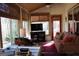 Bright, airy living room with large windows and comfortable seating at 460 Morgan Mill Rd, Brooks, GA 30205