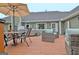 Outdoor wooden deck with dining and seating areas, plus outdoor accents at 175 Thomas Overby Dr, Sharpsburg, GA 30277