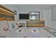 Bedroom showcasing rustic furniture, including a wooden headboard and decorative pillows and quilt at 175 Thomas Overby Dr, Sharpsburg, GA 30277