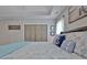Comfortable bedroom with a king-sized bed and blue nautical themed pillows at 175 Thomas Overby Dr, Sharpsburg, GA 30277