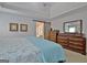 Spacious main bedroom with ensuite bathroom at 175 Thomas Overby Dr, Sharpsburg, GA 30277