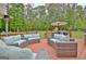 Spacious wood deck features comfortable seating, views of the backyard, perfect for outdoor gatherings at 175 Thomas Overby Dr, Sharpsburg, GA 30277