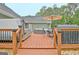Enjoy a meal or relax on the deck with a hot tub, dining set, and outdoor seating at 175 Thomas Overby Dr, Sharpsburg, GA 30277