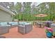 Expansive wood deck with outdoor seating and dining, ideal for entertaining or relaxing outdoors at 175 Thomas Overby Dr, Sharpsburg, GA 30277