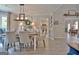 This dining room features an elegant table with seating for six and stylish decor at 175 Thomas Overby Dr, Sharpsburg, GA 30277