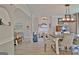 The dining room flows seamlessly into the living spaces of this home at 175 Thomas Overby Dr, Sharpsburg, GA 30277