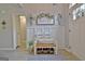 Welcoming foyer featuring stylish decor, storage bench, and a decorative rug at 175 Thomas Overby Dr, Sharpsburg, GA 30277