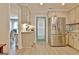 This kitchen features a stainless steel refrigerator and custom cabinets with a striking blue door at 175 Thomas Overby Dr, Sharpsburg, GA 30277