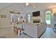 This comfortable living room offers bright windows and a lovely fireplace at 175 Thomas Overby Dr, Sharpsburg, GA 30277