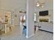 View of the open concept living area, showcasing stylish furnishings and a dining table at 175 Thomas Overby Dr, Sharpsburg, GA 30277