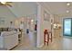 Spacious living room seamlessly connects to the kitchen and dining area, perfect for entertaining at 175 Thomas Overby Dr, Sharpsburg, GA 30277