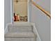 View from the staircase to the upstairs bonus room with built-in bookshelves at 175 Thomas Overby Dr, Sharpsburg, GA 30277