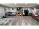 Large living room with a stone fireplace, comfortable seating, and plenty of room for activities at 3456 Village Glen Ct, Snellville, GA 30039