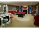 This large game room features a bar, pool table, fireplace and retro game console at 315 Westbourne Dr, Tyrone, GA 30290