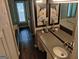 Bathroom featuring gray walls, a spacious vanity, and modern fixtures providing lots of space at 205 Aberdeen Dr, Peachtree City, GA 30269