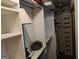 Walk-in closet with built-in shelving, ample storage space, and good lighting at 205 Aberdeen Dr, Peachtree City, GA 30269