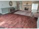 Inviting living room with hardwood floors, stone fireplace, and lots of light at 205 Aberdeen Dr, Peachtree City, GA 30269