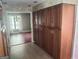 A full wall pantry provides plenty of storage in this kitchen, with an open view to the dining room at 205 Aberdeen Dr, Peachtree City, GA 30269