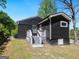 The home's backyard has an entrance and set of steps off to the side at 1599 Ezra Church Nw Dr, Atlanta, GA 30314