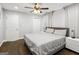 Comfortable main bedroom with ceiling fan, wood flooring, and neutral color palette at 1599 Ezra Church Nw Dr, Atlanta, GA 30314