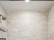 Tiled shower featuring a showerhead at 1599 Ezra Church Nw Dr, Atlanta, GA 30314
