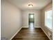 Bright dining room featuring modern floors and a view into the kitchen at 1417 Lavender Nw Dr, Atlanta, GA 30314
