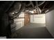 Unfinished basement featuring exposed framework, utilities, and a concrete floor at 2717 Knollberry Ln, Decatur, GA 30034