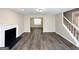 Cozy living room showcasing wood floors and a fireplace at 2717 Knollberry Ln, Decatur, GA 30034