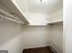 Walk-in closet with wire shelving provides ample storage space in this well organized closet at 2717 Knollberry Ln, Decatur, GA 30034