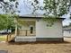 Exterior of home featuring deck and newly seeded grass at 304 N Dogwood Ave, Social Circle, GA 30025