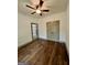 Inviting bedroom with elegant hardwood floors, large closet, and natural lighting at 304 N Dogwood Ave, Social Circle, GA 30025