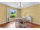 Bright dining room with natural light and hardwood floors at 122 Hilo Rd, Fayetteville, GA 30215