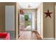 Bright foyer with hardwood flooring and a view of the front yard at 122 Hilo Rd, Fayetteville, GA 30215