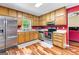 Well-equipped kitchen with stainless steel appliances and ample cabinetry at 122 Hilo Rd, Fayetteville, GA 30215
