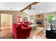 Comfortable living room featuring a stone fireplace and open layout at 122 Hilo Rd, Fayetteville, GA 30215