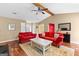 Spacious living room with vaulted ceiling and comfortable seating arrangement at 122 Hilo Rd, Fayetteville, GA 30215
