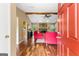 Inviting living room features a cozy stone fireplace and hardwood floors at 122 Hilo Rd, Fayetteville, GA 30215